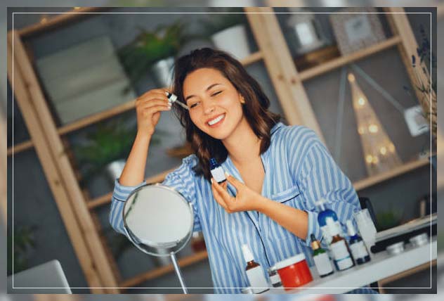 woman applying serum