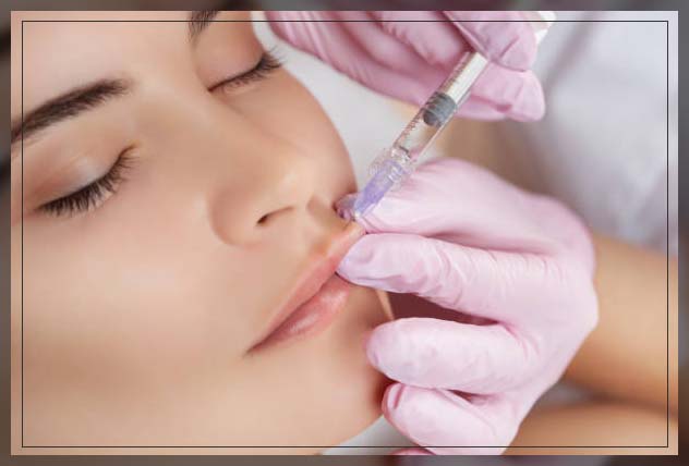 doctor inserting injection in patient's face