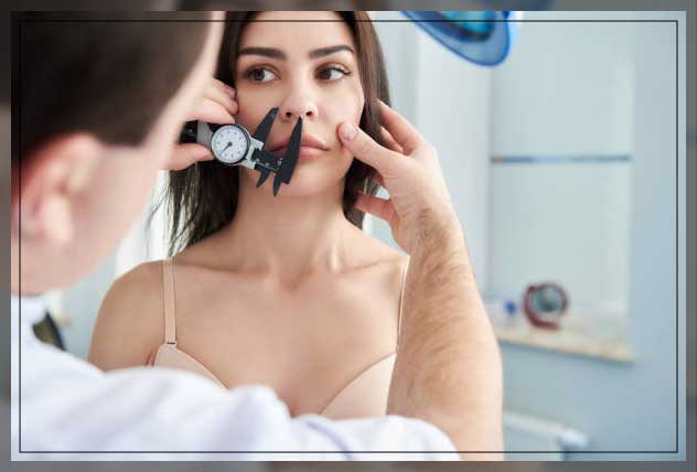 doctor measuring the nostrils size